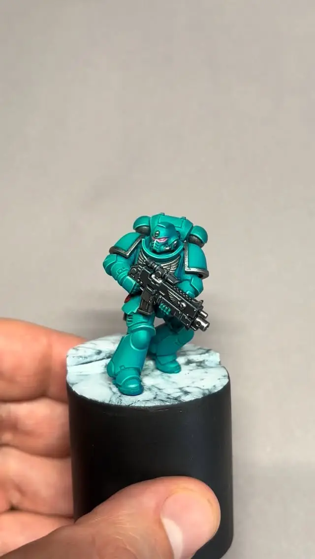 Day 4 of my experiment and I'm already feeling like I've made huge progress in fighting my perfectionism. I'm pretty sure I wouldn't have come up with this colorscheme if I weren't forcing myself into more airbrushing and imperfection. The mini is taking the most time so far, but in my opinion, it's also the prettiest! Took 3h to get the mini to this level, and developing this jade petrol look was super fun! What do you think of this scheme? Got any good ideas for chapter names? Which could be the main chapter of this successor chapter? 

#warhammer #warhammer40k #miniaturepainting #paintingwarhammer #warhammercommunity