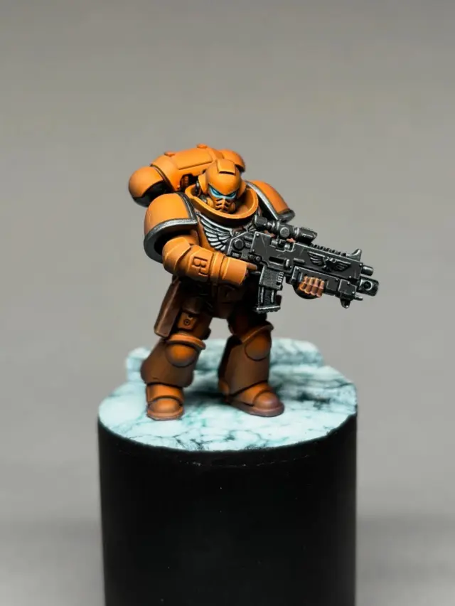 🔥 Breaking Perfectionism With Pure Color

This orange Primaris became my reminder that speed, instinct, and bold choices can teach you more than hours of polishing ever will.

I started from a black prime, hit a zenithal with Pro-Acryl Bold Titanium White, then pushed the volumes with Transparent Violet → Transparent Orange. The armor popped instantly—no overthinking, no micro-blending. Just trusting the glow. Edge highlights with Fire Dragon Bright and Screaming Skull brought the whole silhouette to life.

All in 2h 40min, all while forcing myself to stay loose, limit colors, and let the model breathe. And honestly? The result feels more alive than half the “perfect” minis I’ve labored over.

The message this time:
Your style grows when you stop fighting mistakes and start painting with intention.

How does this orange scheme read to you at first glance?

#warhammer #warhammer40k #miniaturepainting #paintingwarhammer #warhammercommunity