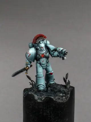 🐺 Luna Wolves MK IV Armor W.I.P. 🚧

Another step closer to the finish line!

The miniature itself is now complete, and I’m really happy with how the subtle Luna Wolves armour turned out. The only thing left is bringing the swamp base to life and tying the whole scene together.

One thing I experimented with on this project was creating my own airbrush stencils. Instead of drawing every freehand element from scratch, I designed simple basic shape stencils for the XVI Legion numeral and the Luna Wolves emblem. They don’t replace freehand painting, but they provide a clean foundation to paint over… which is a huge help if, like me, your drawing skills aren’t exactly legendary. 😄

It made the process faster, more consistent, and honestly much more enjoyable.

I’m thinking this little experiment might deserve its own tutorial alongside the painting and basing guides. 👀

What do you think?
Would you be interested in seeing how I create and use these custom airbrush stencils?

#warhammer #horusheresy #warhammercommunity #miniaturepainting #paintingwarhammer